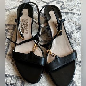 Salvatore Ferragamo
Patent Leather T-Strap Sandals